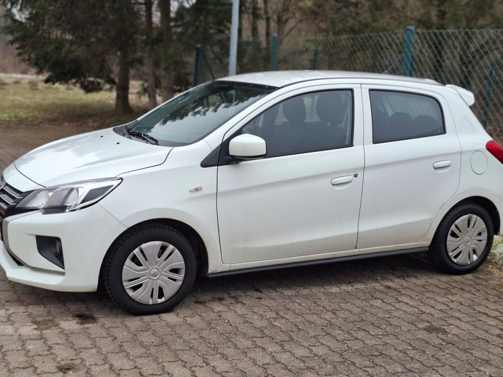 Weißer Mitsubishi Space Star – mein erster Neuwagen für mehr Zuverlässigkeit und Planbarkeit.